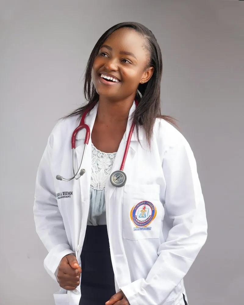 Smiling healthcare professional in a white coat